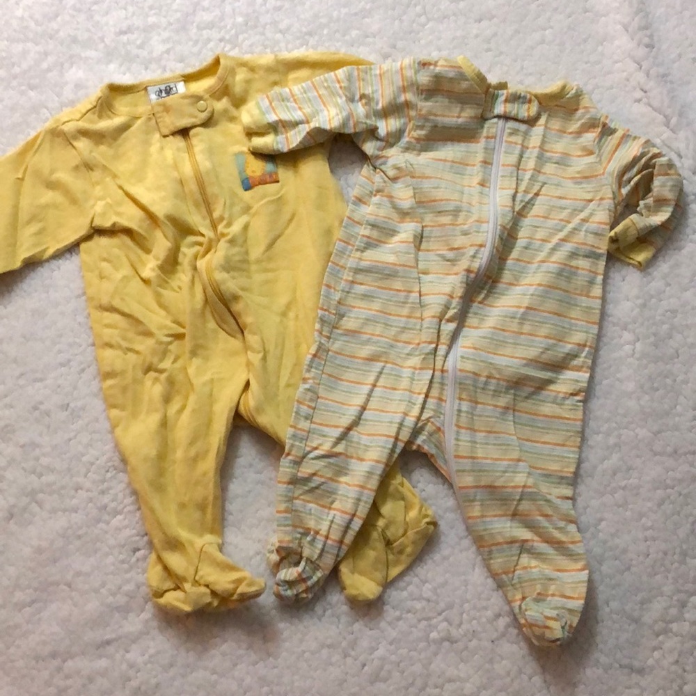 2 one-piece sleepers.  0-3 months